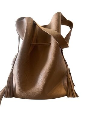 Anthropologie Drawstring Tan Pebbled Vegan Leather Bucket Bag with Tassels